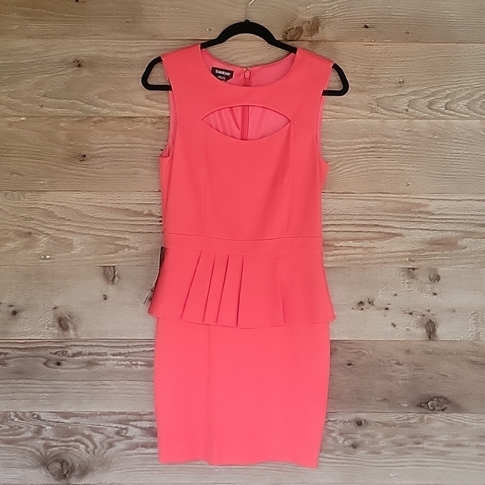 NWT Bebe Coral Peakaboo Pointe Peplum Dress Size Medium